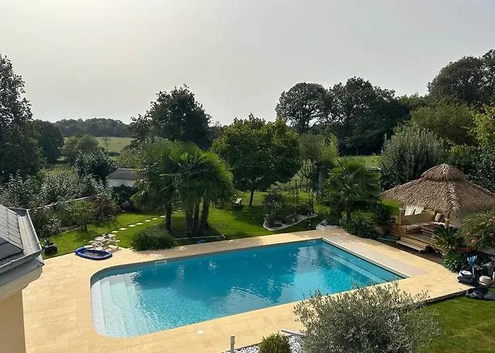 Loue Pour Manifestation Circuit Des 24H 4 Chambres De Standing Dans Un Ecrin De Verdure Habitación en casa particular